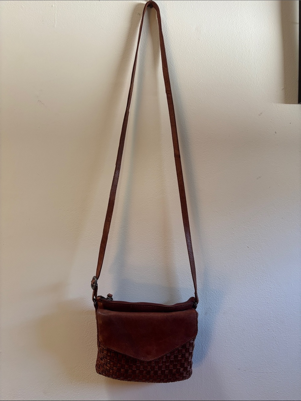 Brown Woven Leather Crossbody Bag with Flap and Adjustable Strap